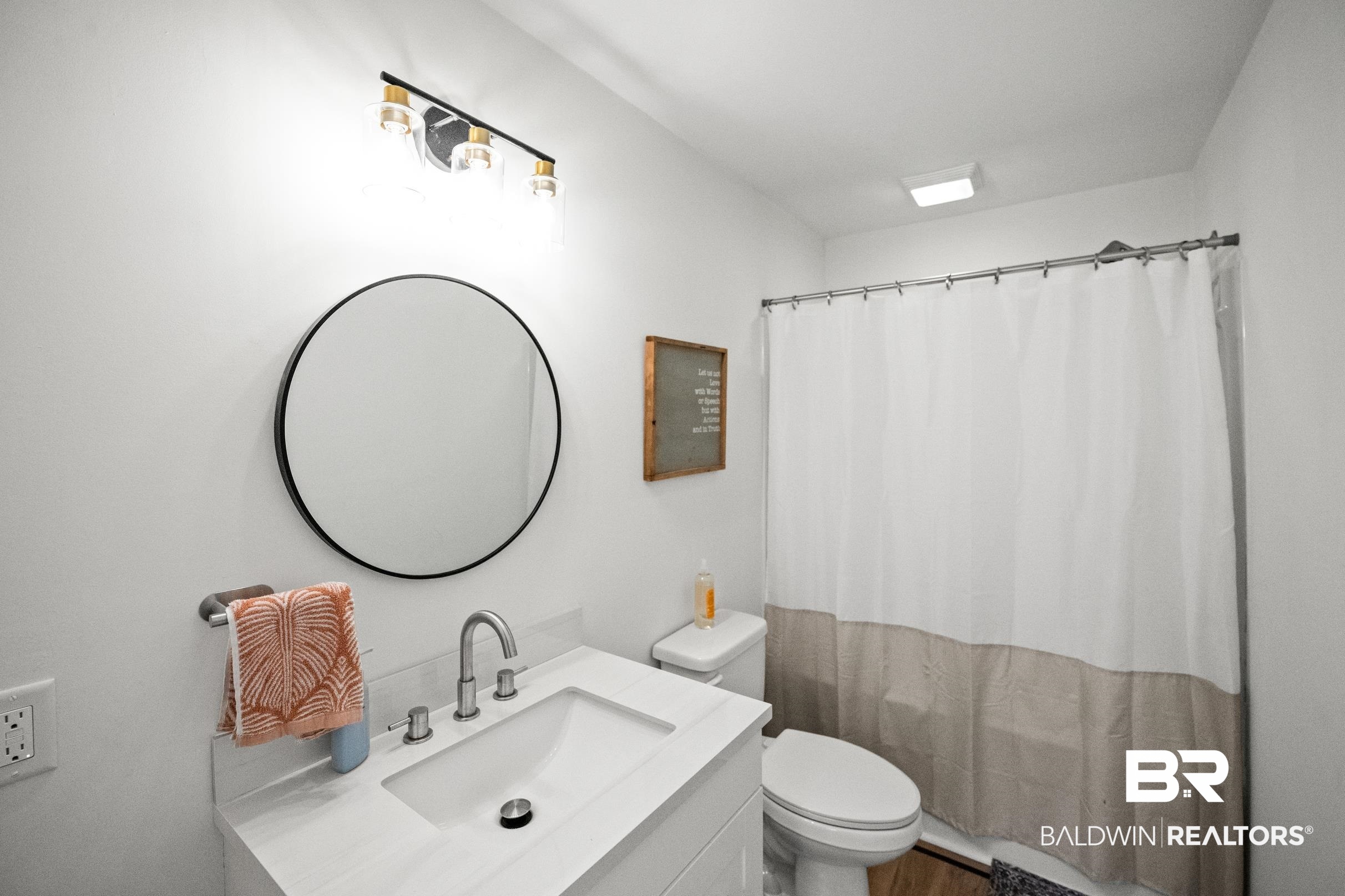 6 Wren Circle Foley, AL 36535 - Photo 25 of 55 Full bath featuring vanity, toilet, and a shower with curtain