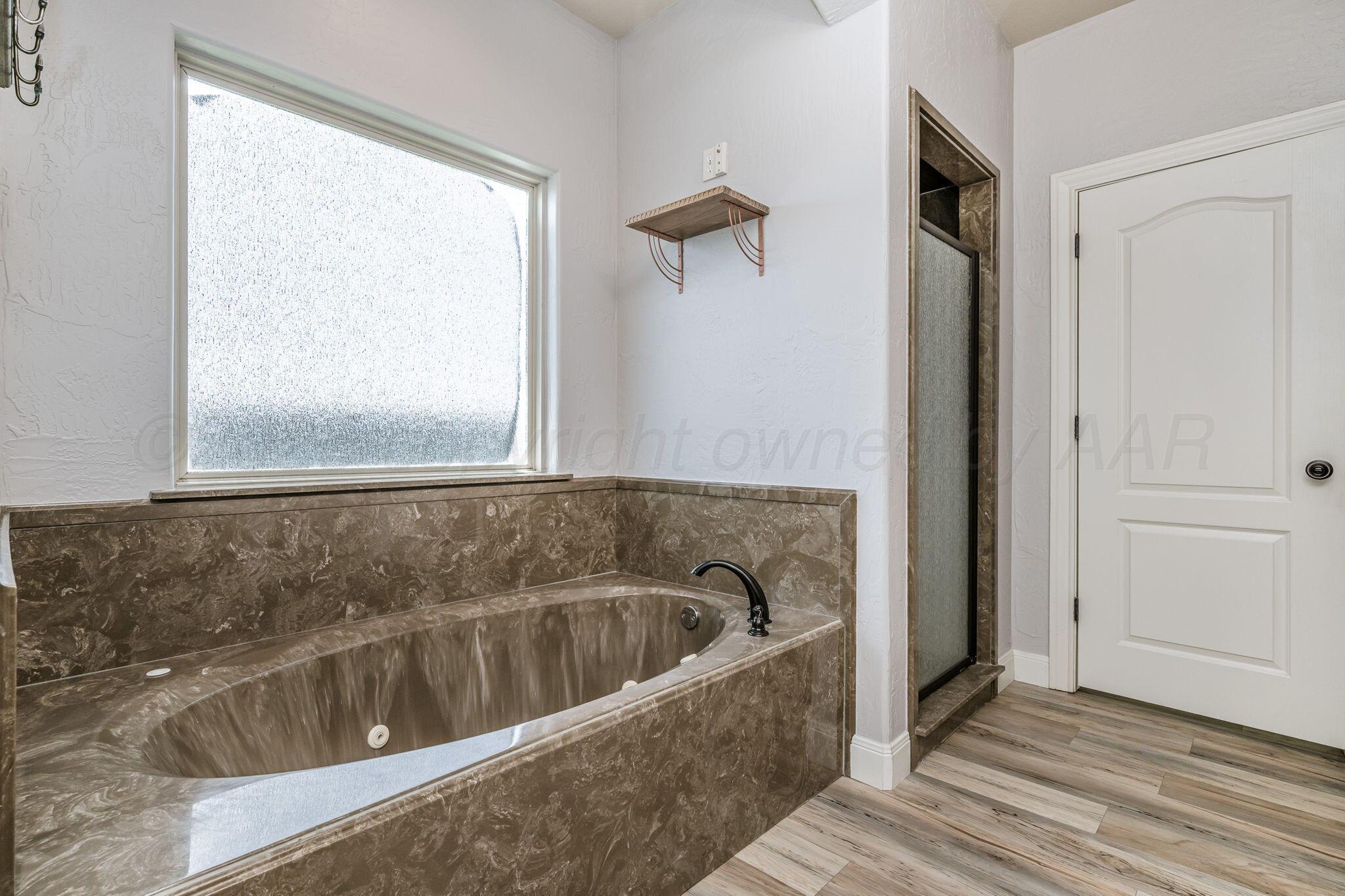 11601 West Rockwell Road Canyon, TX 79015 - Photo 13 of 37 Primary Bath