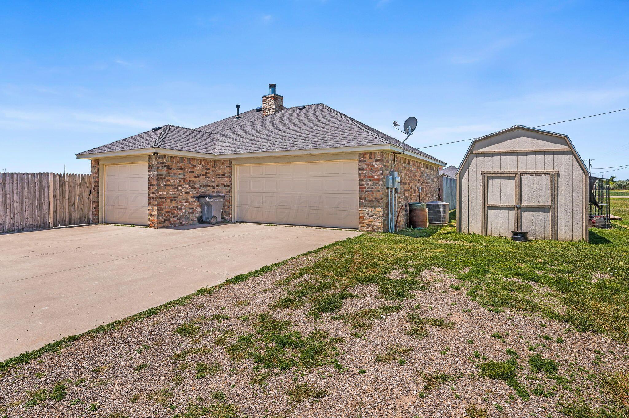 11601 West Rockwell Road Canyon, TX 79015 - Photo 25 of 37 Garage View