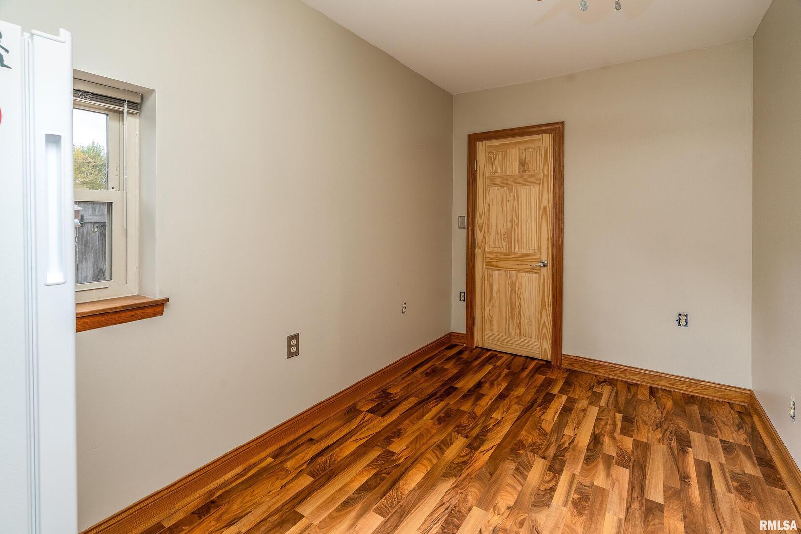 306 South Madison Street Marion, IL 62959 - Photo 28 of 37 a view of a room with wooden floor