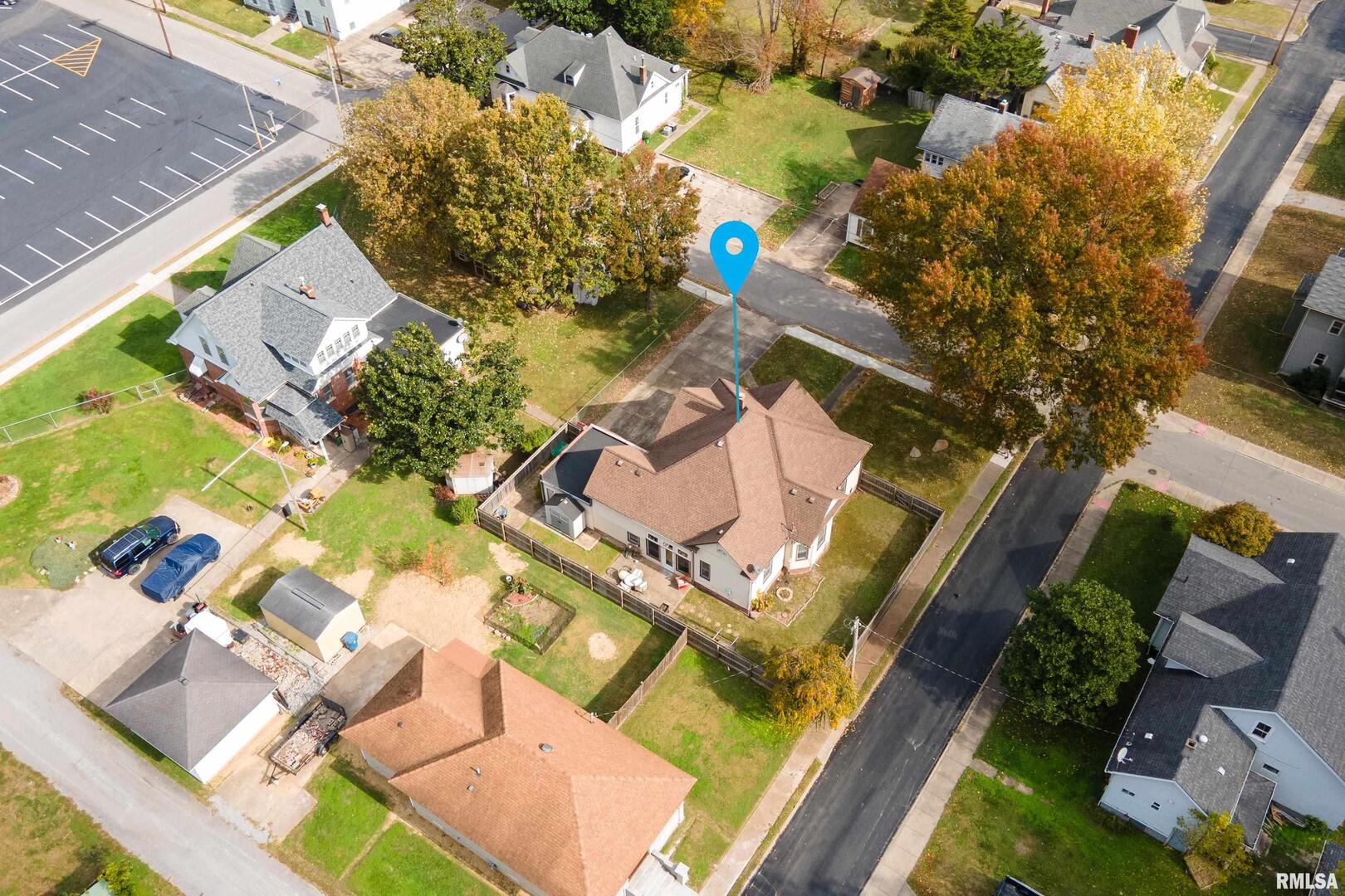 306 South Madison Street Marion, IL 62959 - Photo 35 of 37 an aerial view of a house with a swimming pool