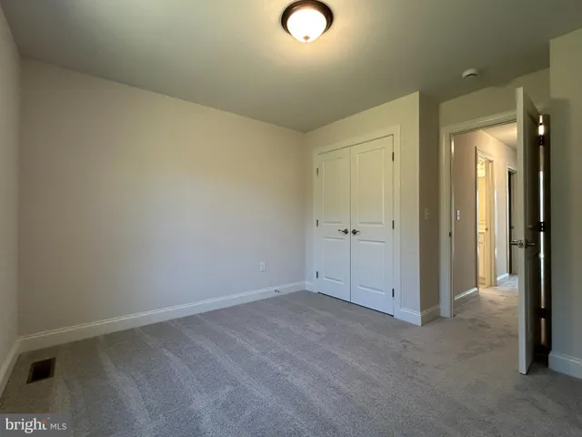 an empty room with closet