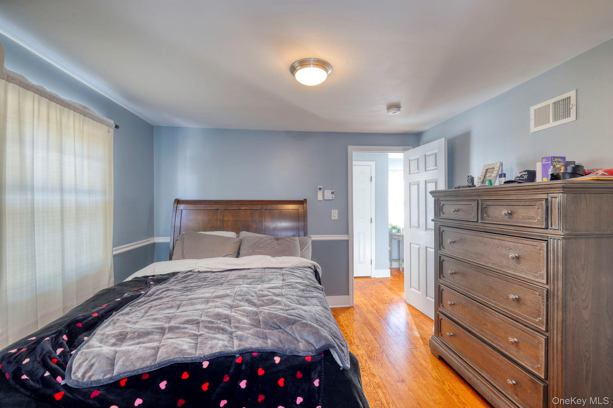 210 Overlook Road Poughkeepsie, NY 12603 - Photo 24 of 43 Bedroom featuring light wood-type flooring and baseboards