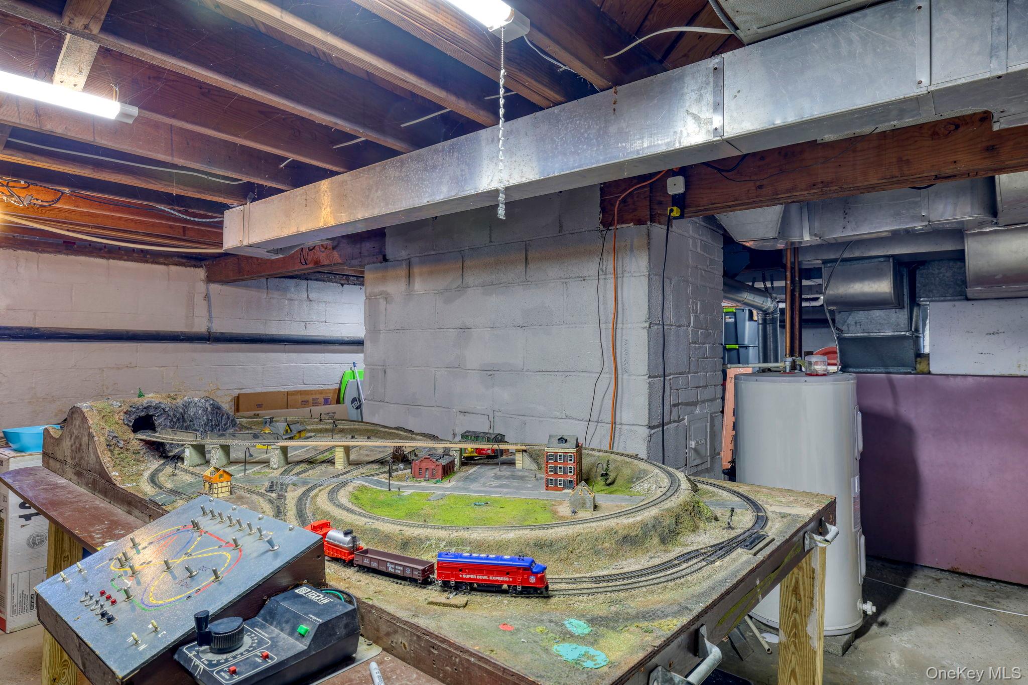 210 Overlook Road Poughkeepsie, NY 12603 - Photo 29 of 43 Unfinished basement featuring electric water heater