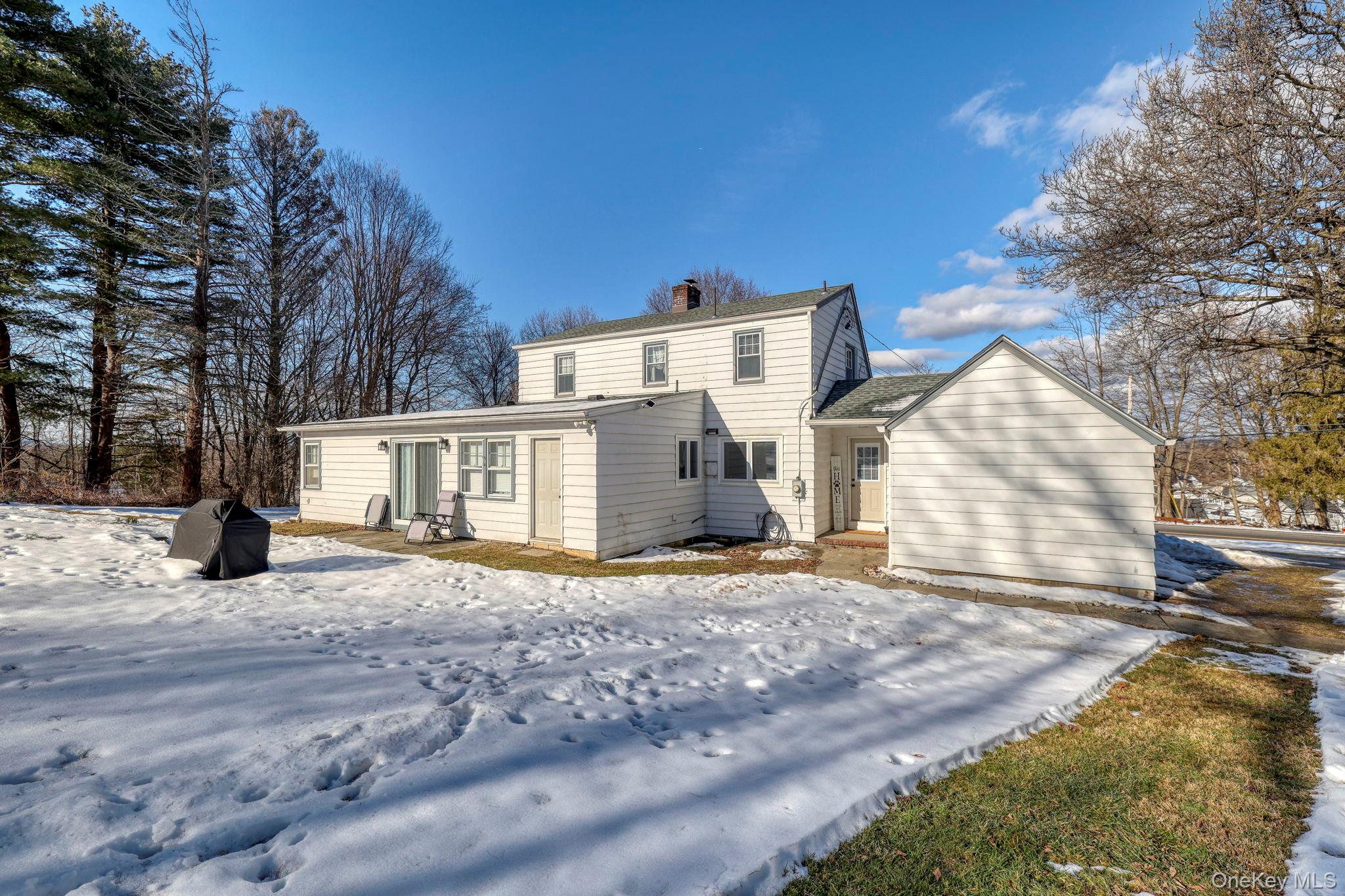210 Overlook Road Poughkeepsie, NY 12603 - Photo 32 of 43 Snow covered property featuring a chimney