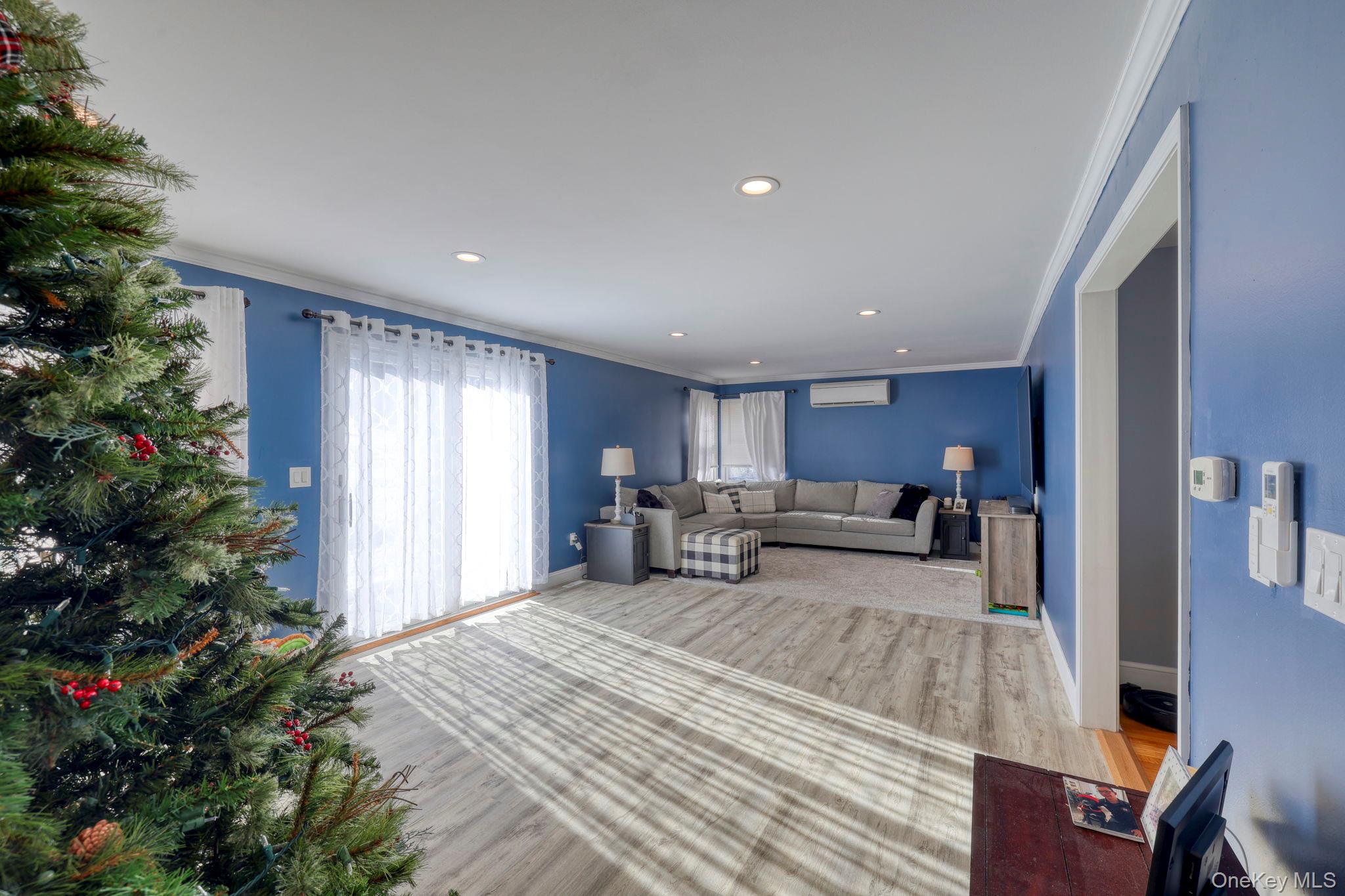 210 Overlook Road Poughkeepsie, NY 12603 - Photo 5 of 43 Living room featuring ornamental molding, wood finished floors, and recessed lighting