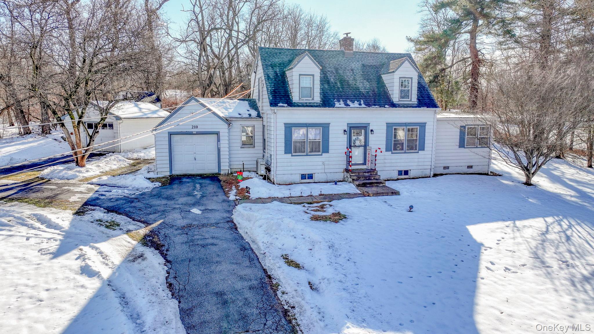 210 Overlook Road Poughkeepsie, NY 12603 - Photo 10 of 43 New england style home with a chimney and a garage