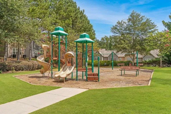 a view of a park with swings