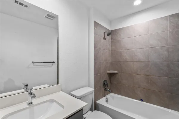 a bathroom with a sink and a bathtub