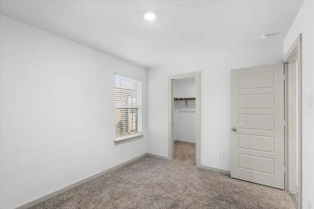 a swimming pool with wooden fence