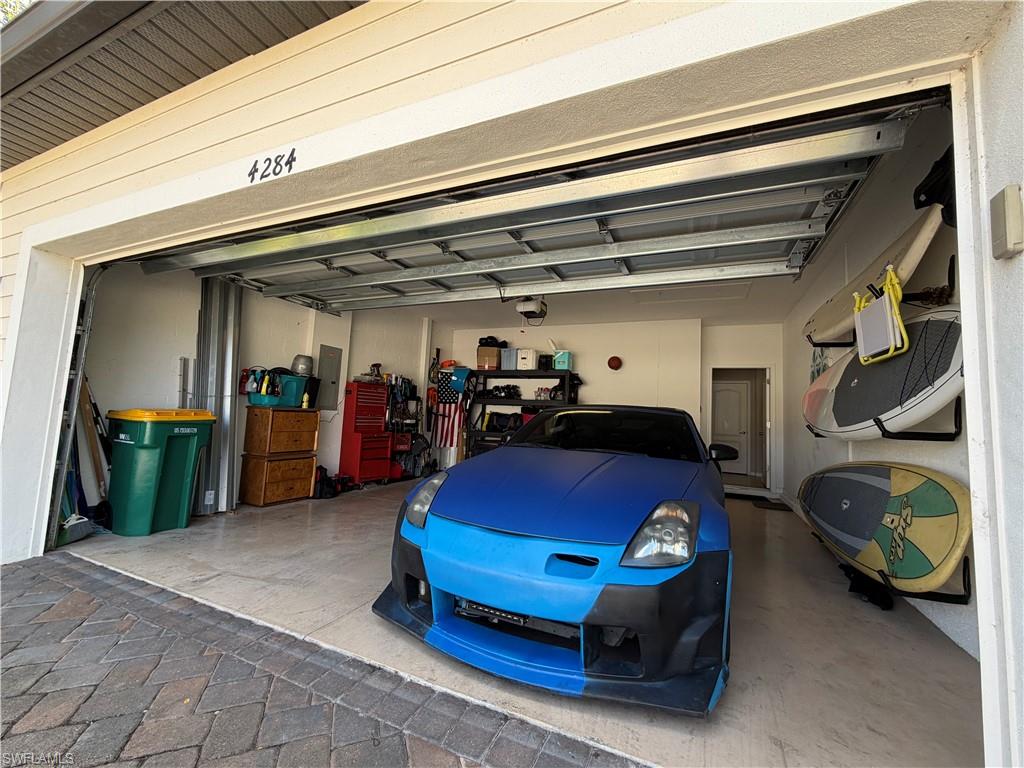 4284 Raffia Palm Circle Naples, FL 34119 - Photo 18 of 50 Garage with electric panel