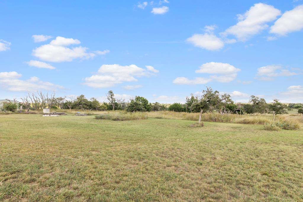 192 Chuckwagon Trail Harper, TX 78631 - Photo 20 of 23 a view of an ocean and beach