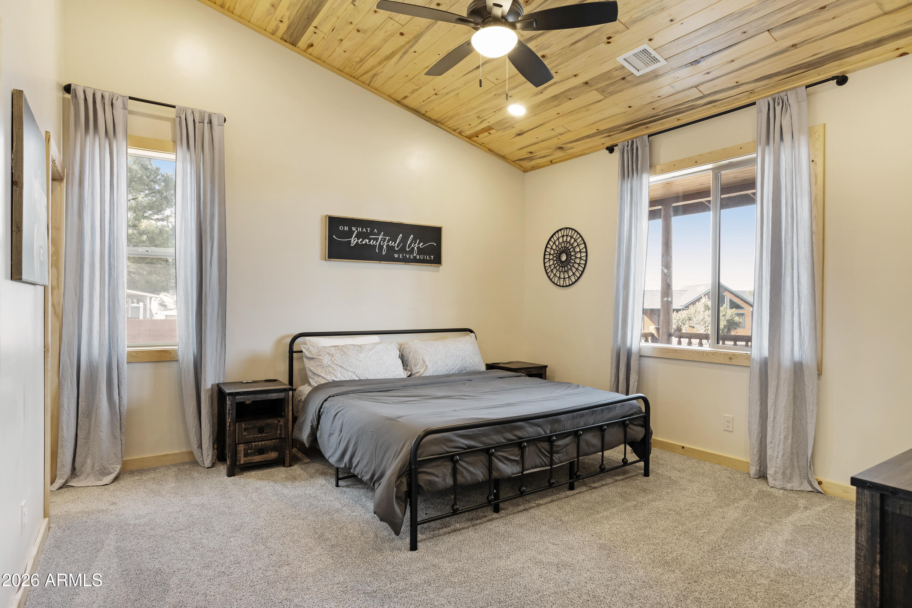 2718 Church Lane Overgaard, AZ 85933 - Photo 18 of 50 a bedroom with a bed and a window