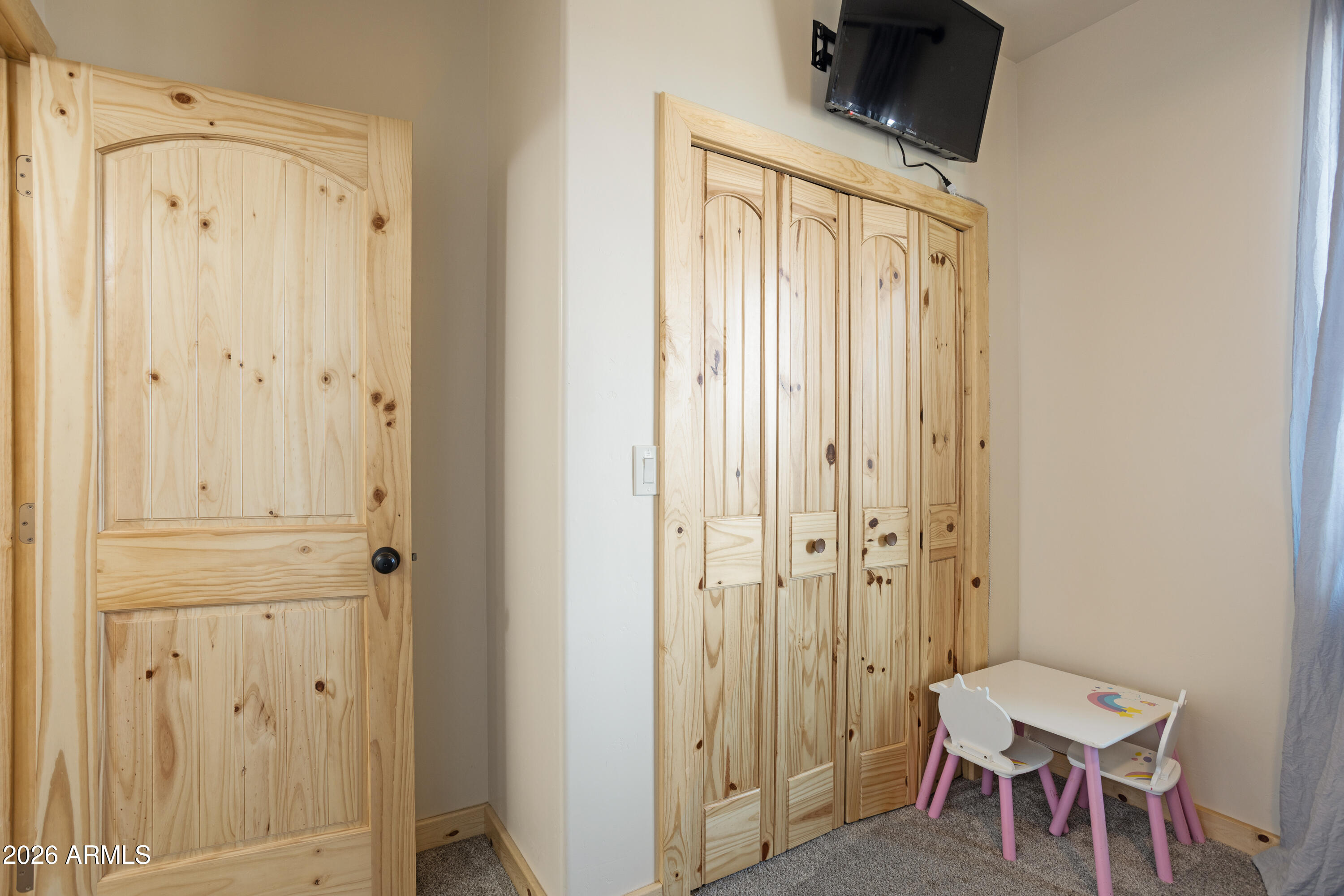 2718 Church Lane Overgaard, AZ 85933 - Photo 24 of 50 a view of a hallway with furniture and a front door