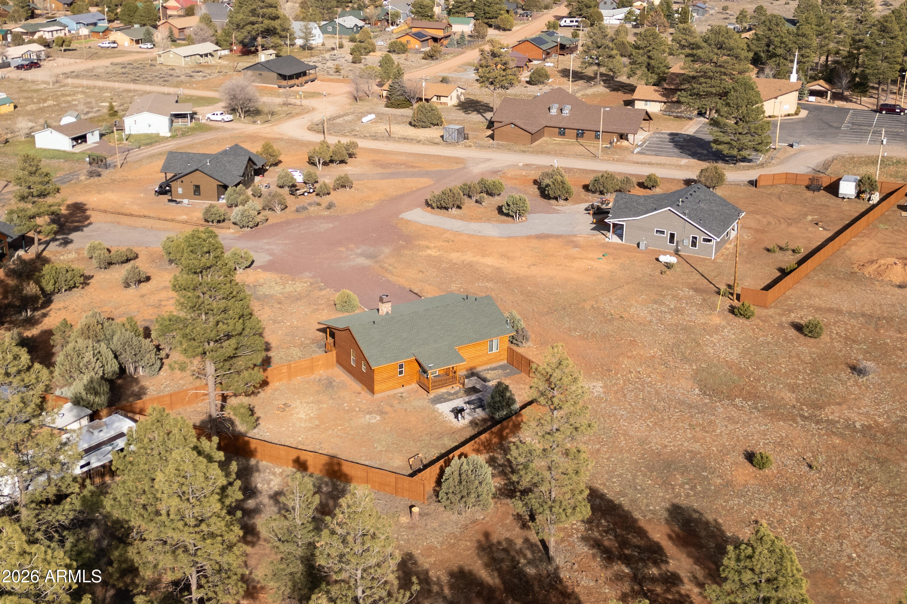 2718 Church Lane Overgaard, AZ 85933 - Photo 30 of 50 an aerial view of a house with a yard
