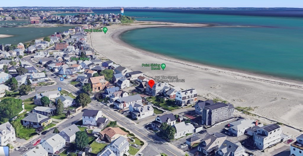 121 The Strand Winthrop, MA 02152 - Photo 1 of 13 an aerial view of a house with a lake view