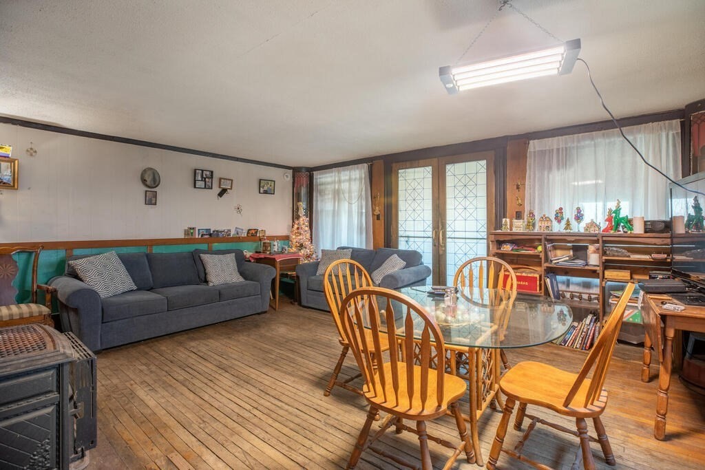 121 The Strand Winthrop, MA 02152 - Photo 7 of 13 a living room with furniture and a large window