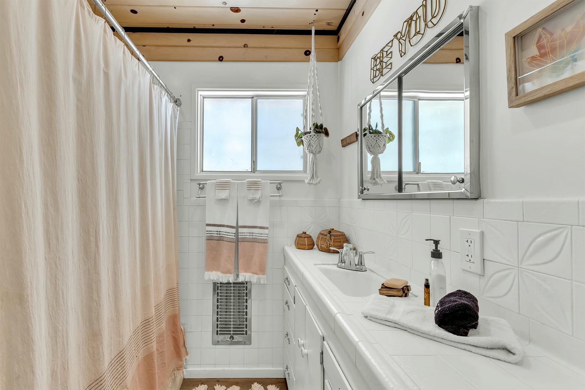 52660 Sylvan Way Idyllwild, CA 92549 - Photo 20 of 25 a bathroom with a sink and a mirror