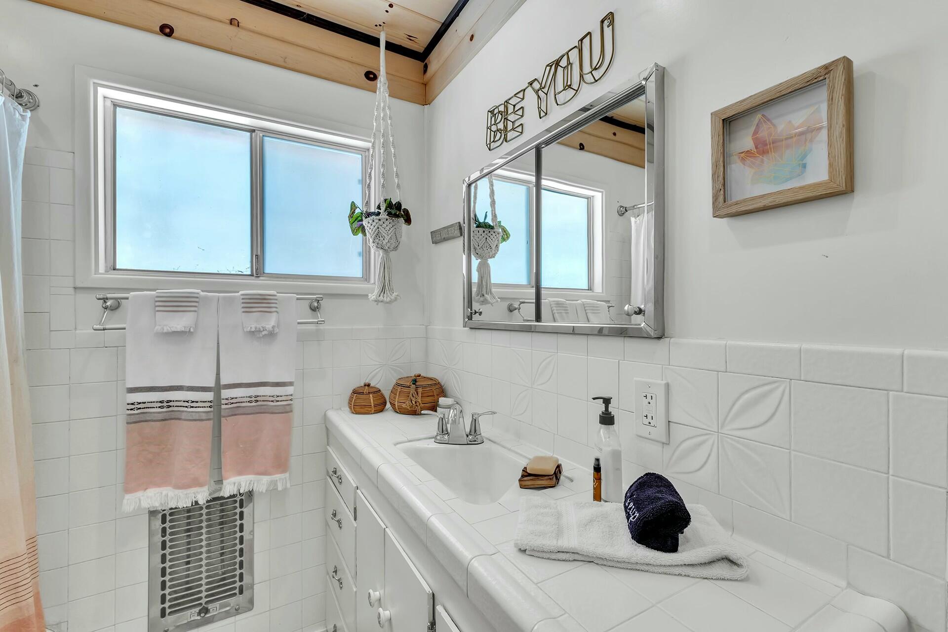52660 Sylvan Way Idyllwild, CA 92549 - Photo 21 of 25 a bathroom with a sink and a mirror