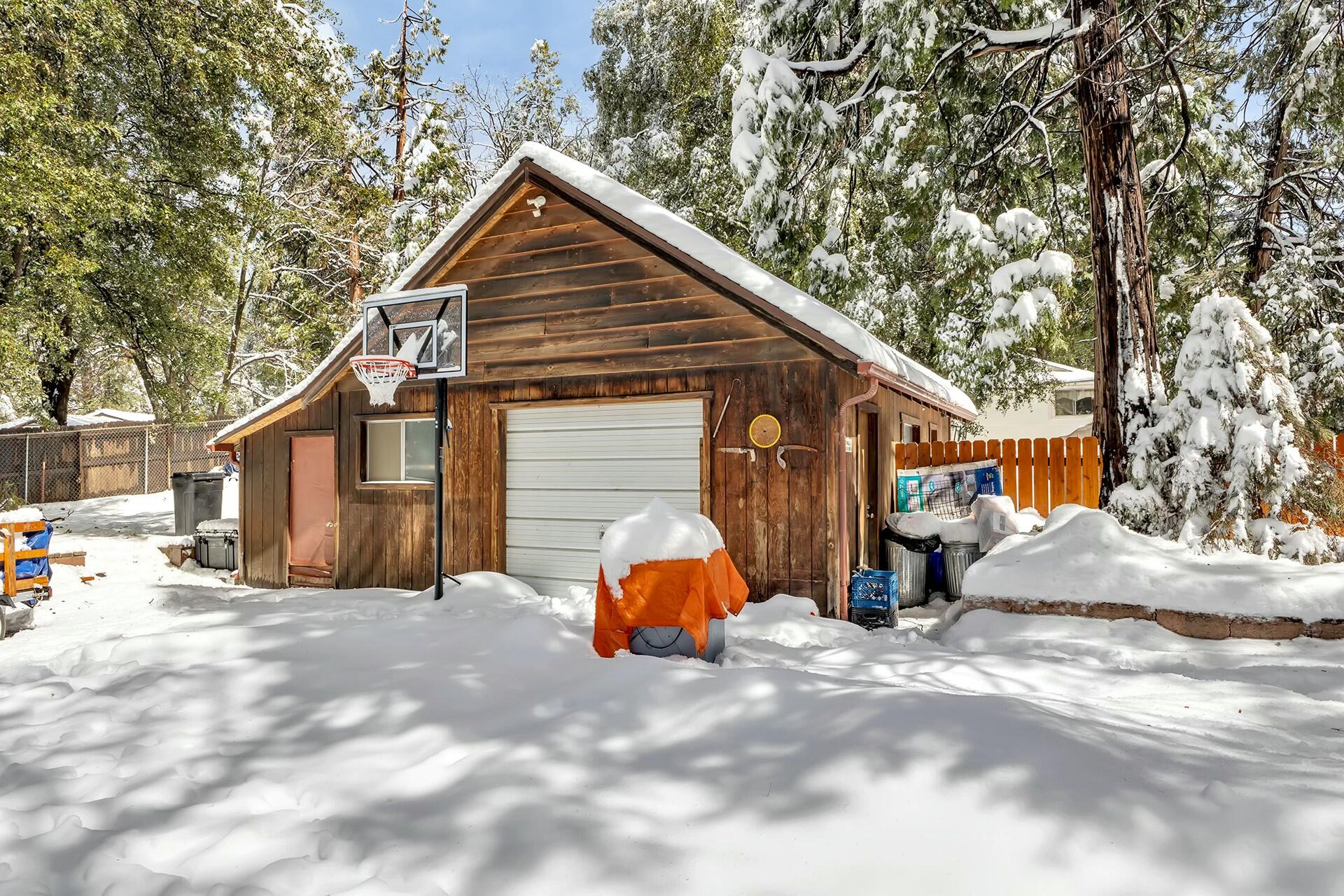 52660 Sylvan Way Idyllwild, CA 92549 - Photo 25 of 25 a backyard of a house with fire pit and chairs