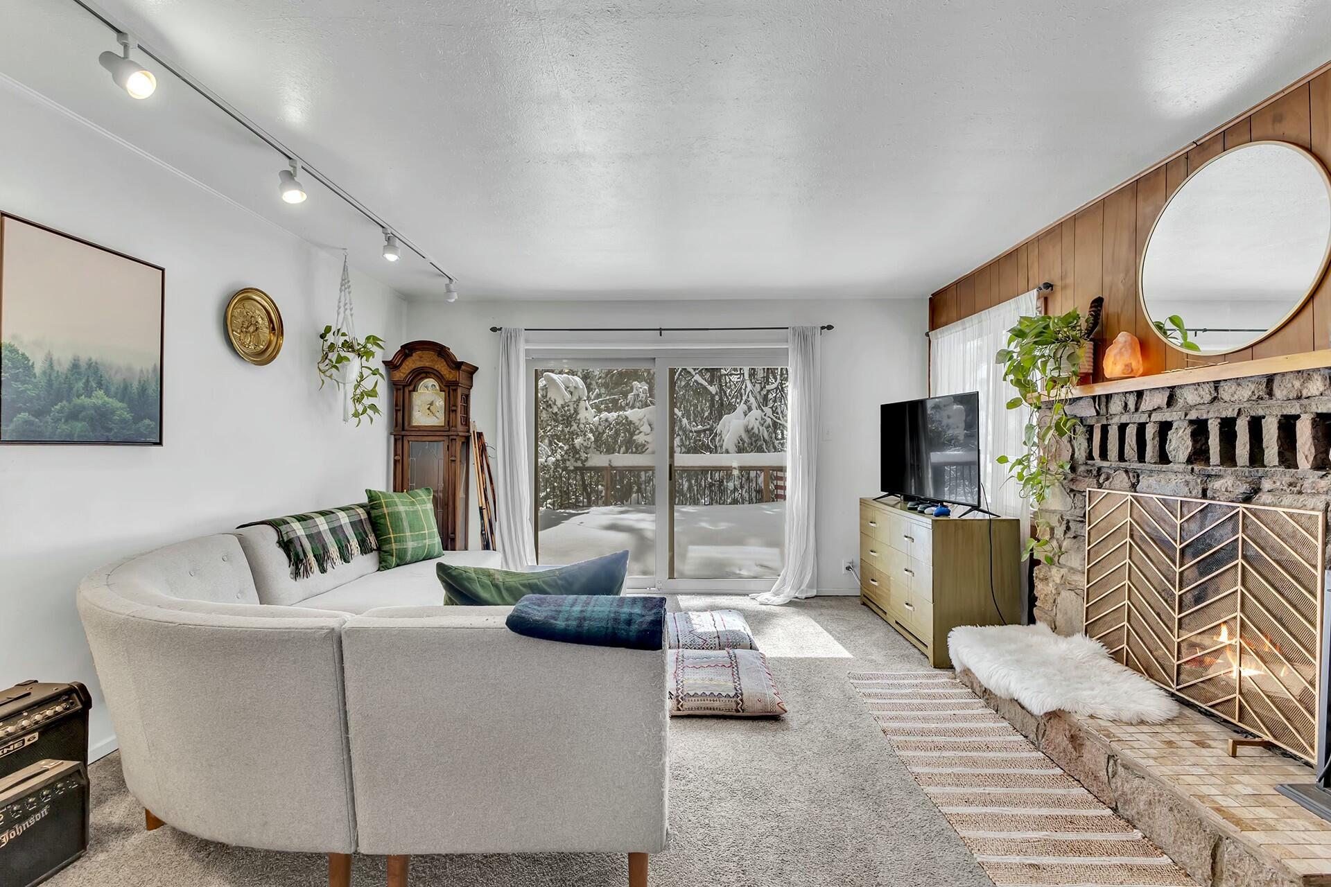 52660 Sylvan Way Idyllwild, CA 92549 - Photo 4 of 25 a living room with furniture a rug and a large window