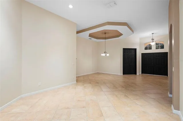 a kitchen filled a sink a counter top space and stainless steel appliances
