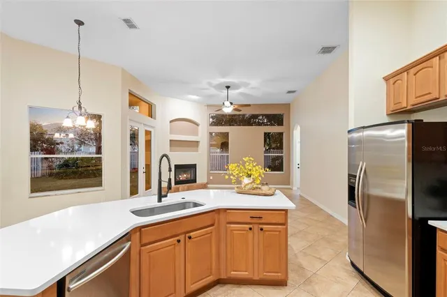 a view of living room with a sink and couch