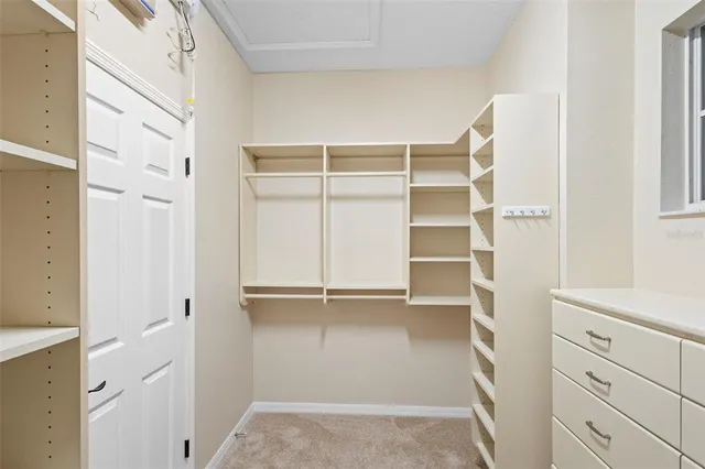 a view of an empty walk in closet
