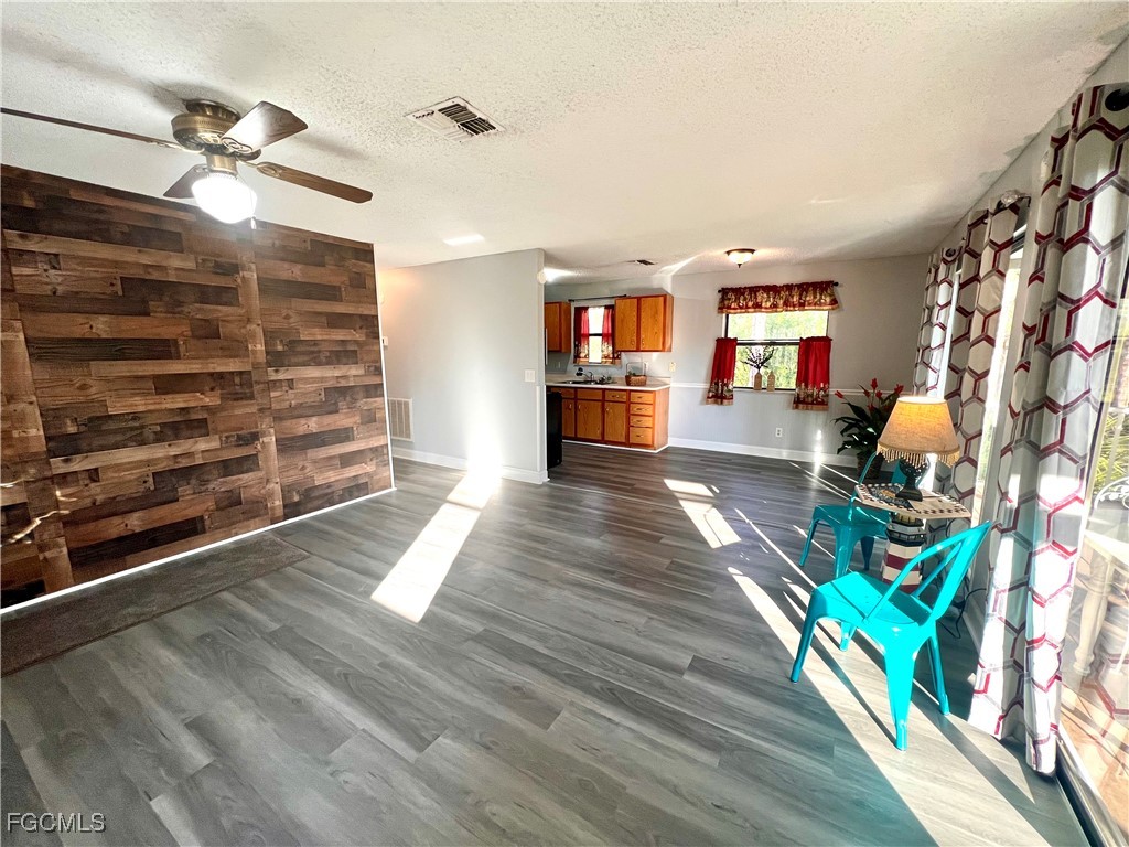 2002 Truman Avenue Alva, FL 33920 - Photo 19 of 30 a living room with furniture and a wooden floor