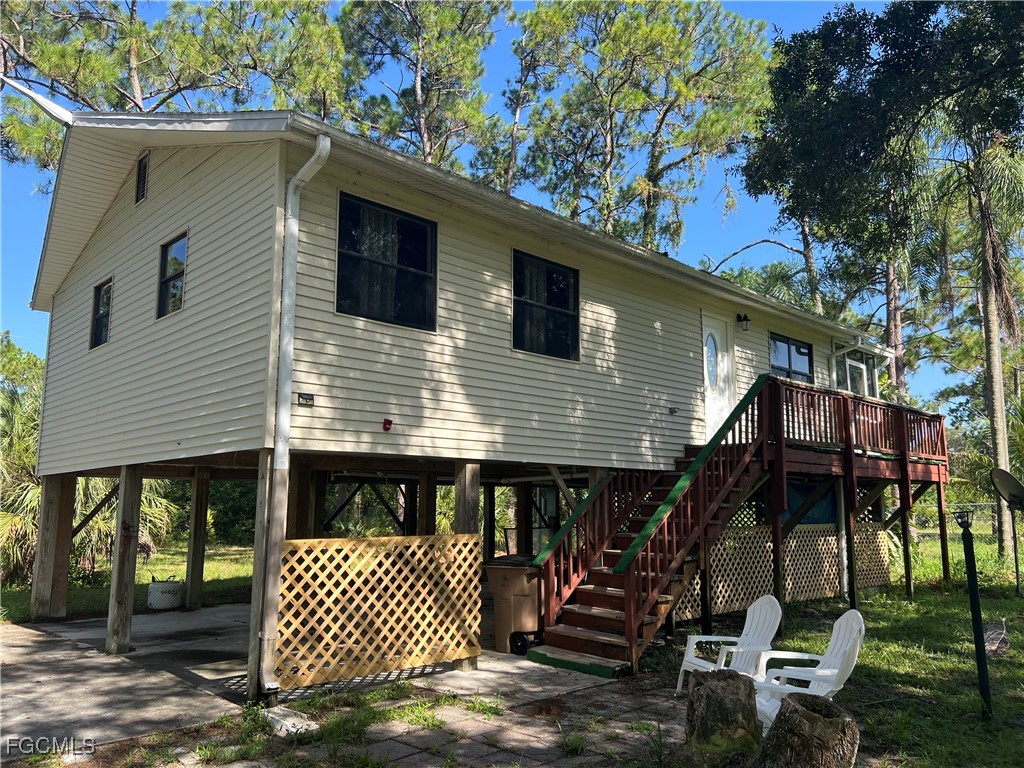 2002 Truman Avenue Alva, FL 33920 - Photo 26 of 30 a front view of a house with garden