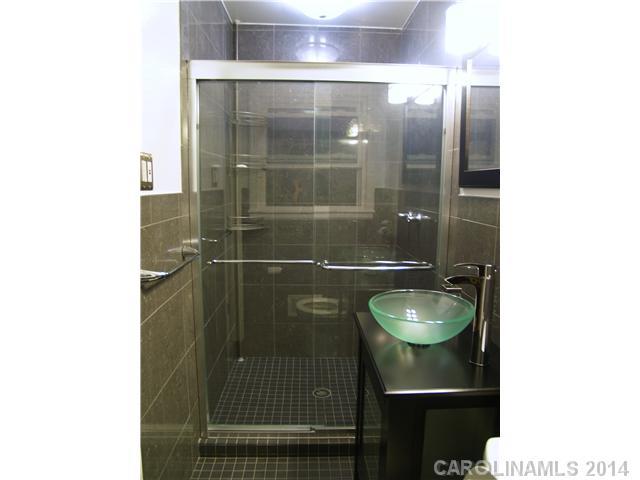 5320 Seacroft Road Charlotte, NC 28210 - Photo 8 of 12 a bathroom with a shower