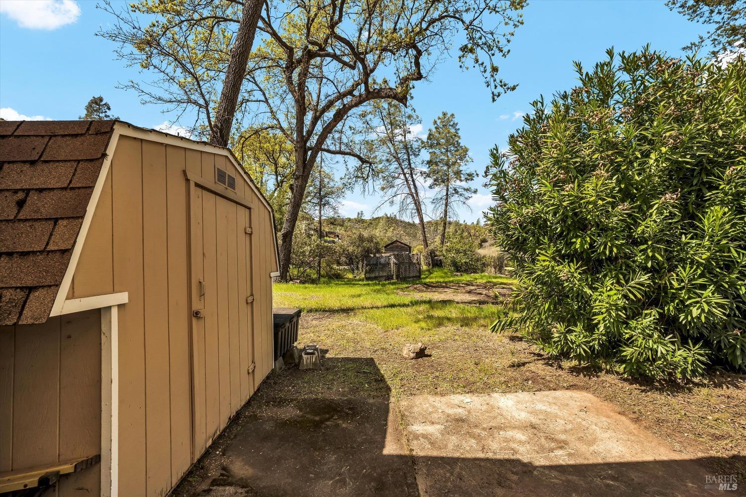 2230 Stagecoach Canyon Road Pope Valley, CA 94567 - Photo 13 of 29 a view of a yard with wooden fence