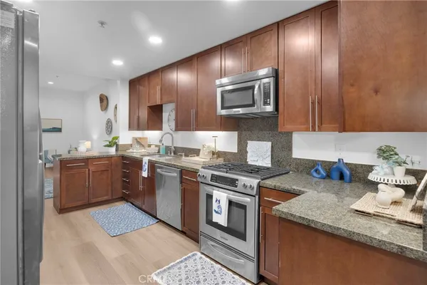 a kitchen with a table and a stove