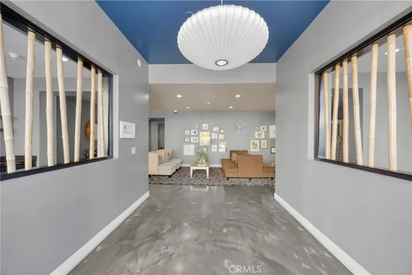 a view of a large room with many windows