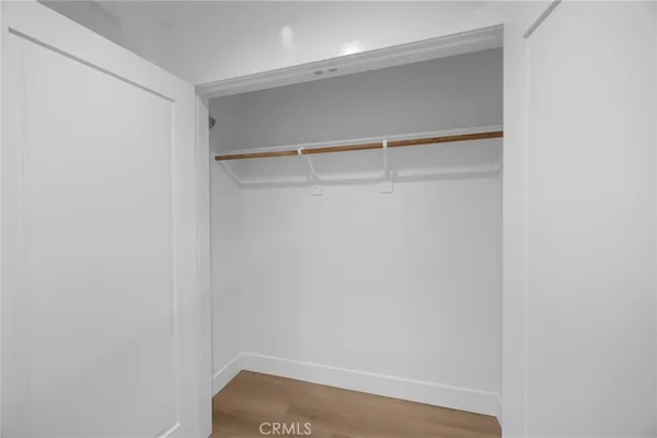 a spacious bathroom with a double vanity sink mirror and double