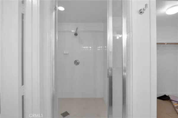 a view of an empty walk in closet