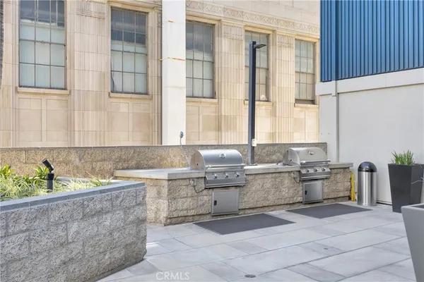 a view of a street with a building in the background