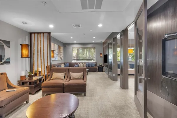 a kitchen with stainless steel appliances a sink and a stove