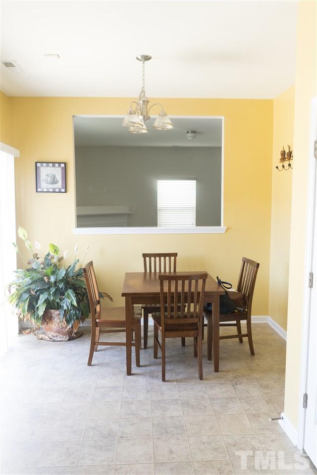 3716 Madeline Way Raleigh, NC 27610 - Photo 6 of 17 a view of a dining room with furniture
