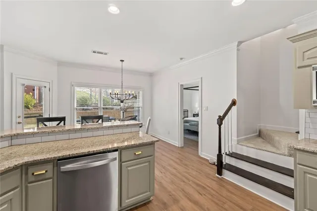 a dining room with furniture window wooden floor