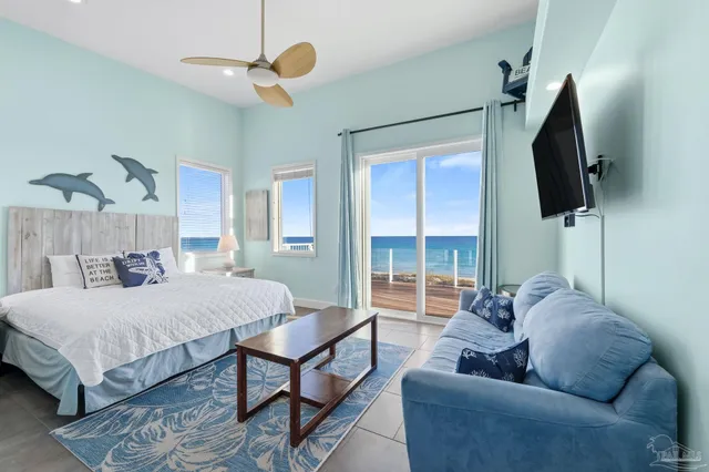 a view of a balcony with wooden floor and outdoor space