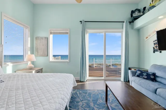 a bathroom with a granite countertop tub sink and mirror