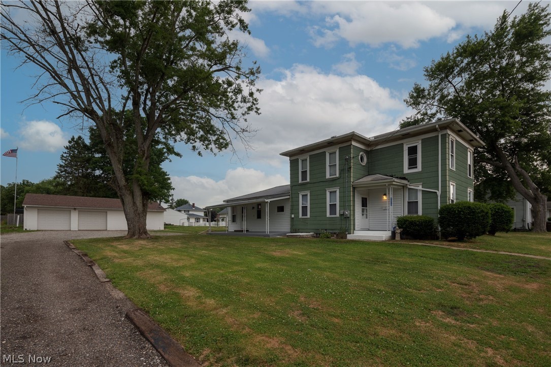 5117 Ridge Avenue Southeast Canton, OH 44707 - Photo 2 of 24 Great Opportunity! Almost 1900 Sq. Ft. of living space and a 2+car detached garage with workshop!