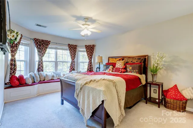 a bathroom with a double vanity sink and mirror
