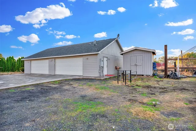 a house view with a backyard space