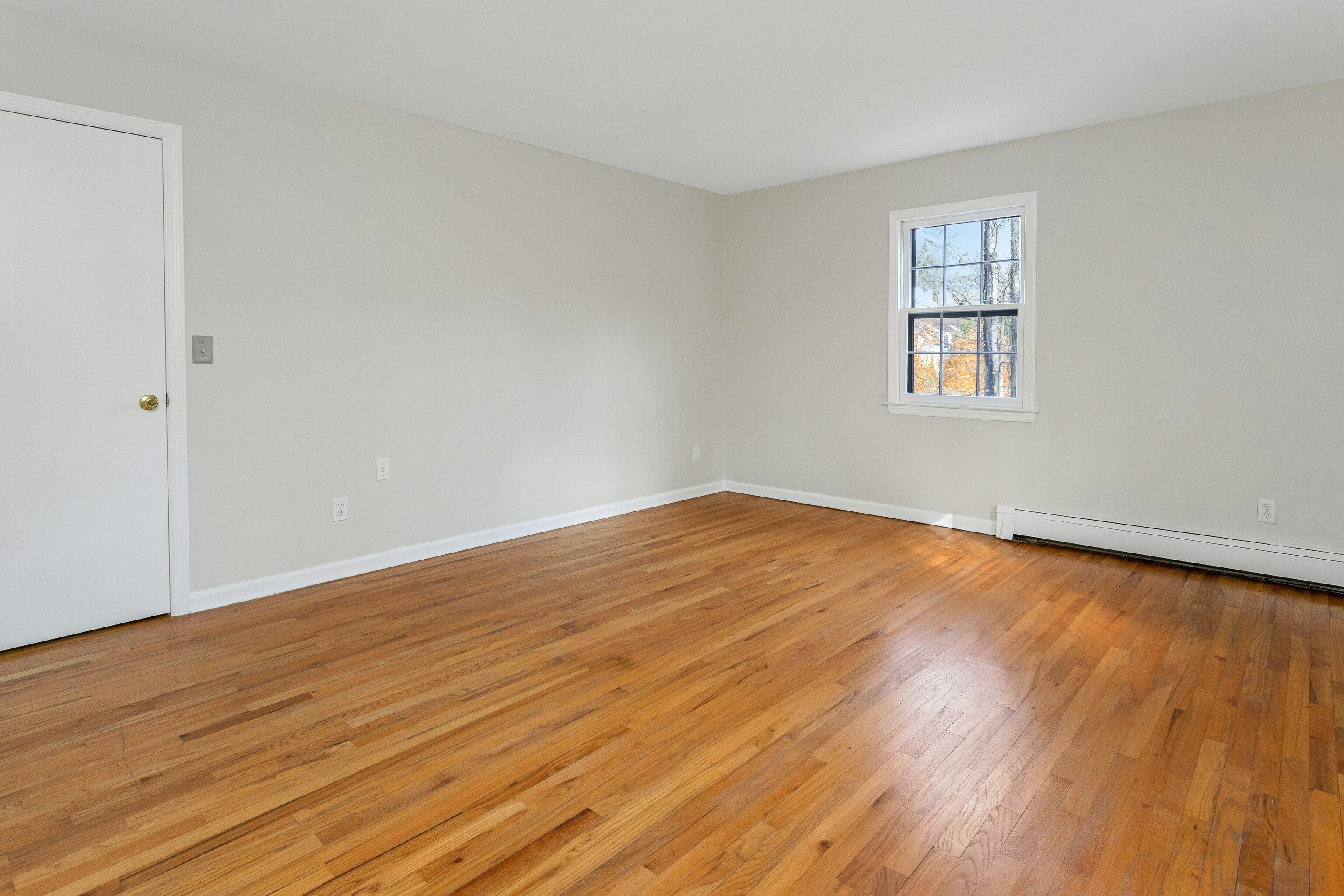 64 Jelliff Mill Road New Canaan, CT 06840 - Photo 13 of 24 a view of empty room with wooden floor and fan