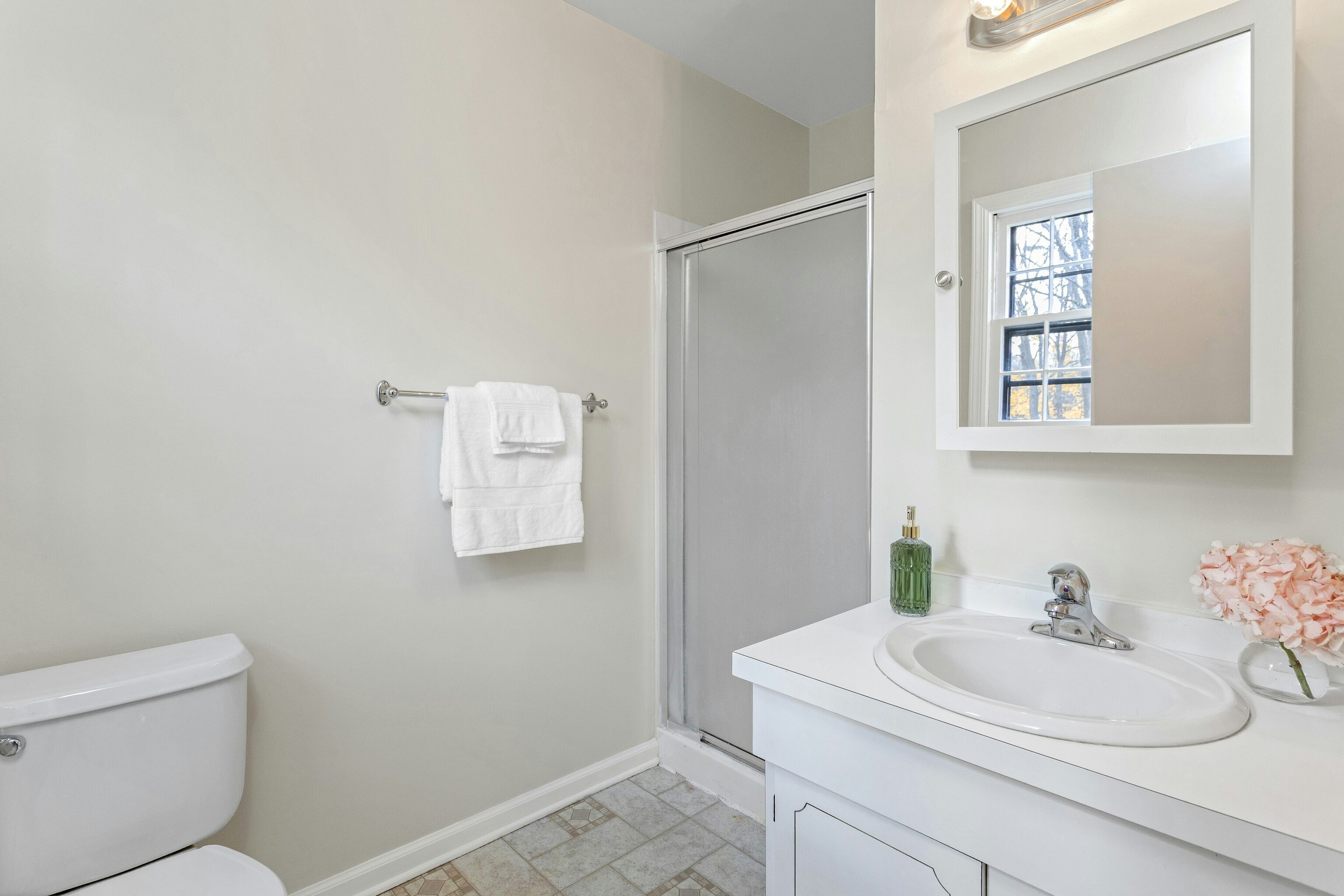 64 Jelliff Mill Road New Canaan, CT 06840 - Photo 15 of 24 a bathroom with a sink toilet and mirror