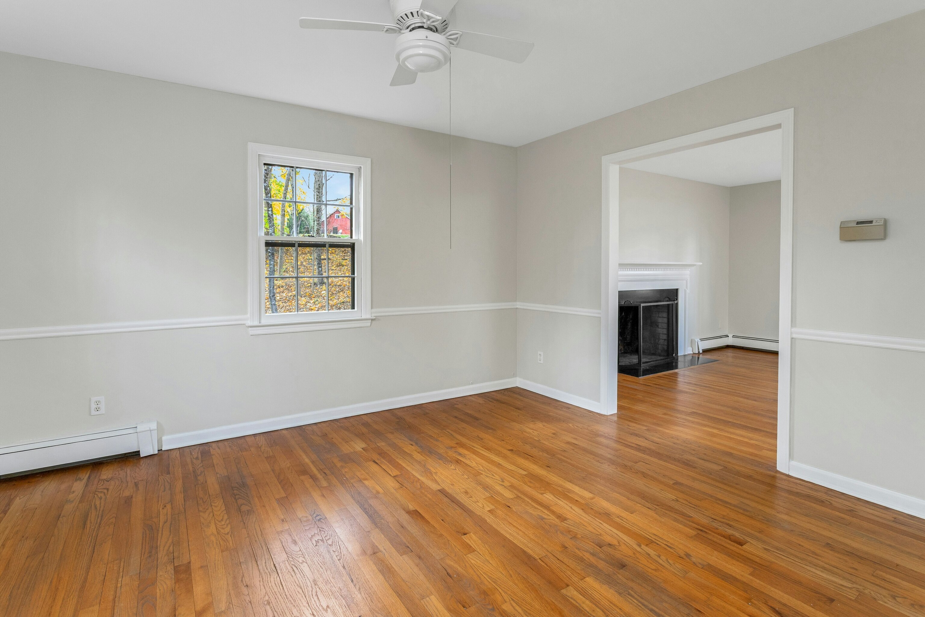 64 Jelliff Mill Road New Canaan, CT 06840 - Photo 7 of 24 wooden floor in an empty room with a window