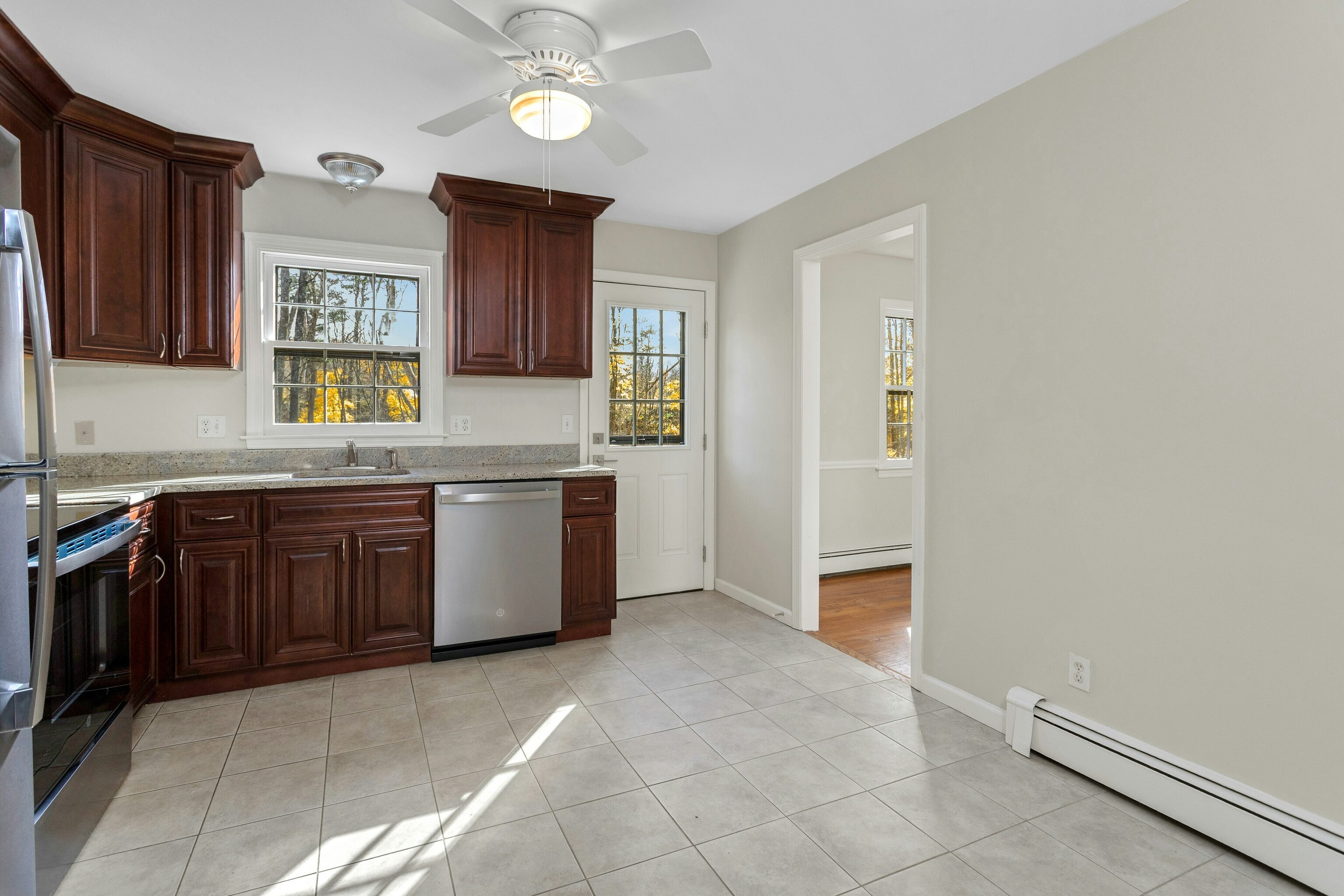 64 Jelliff Mill Road New Canaan, CT 06840 - Photo 10 of 24 a kitchen with stainless steel appliances granite countertop a stove a sink and a refrigerator