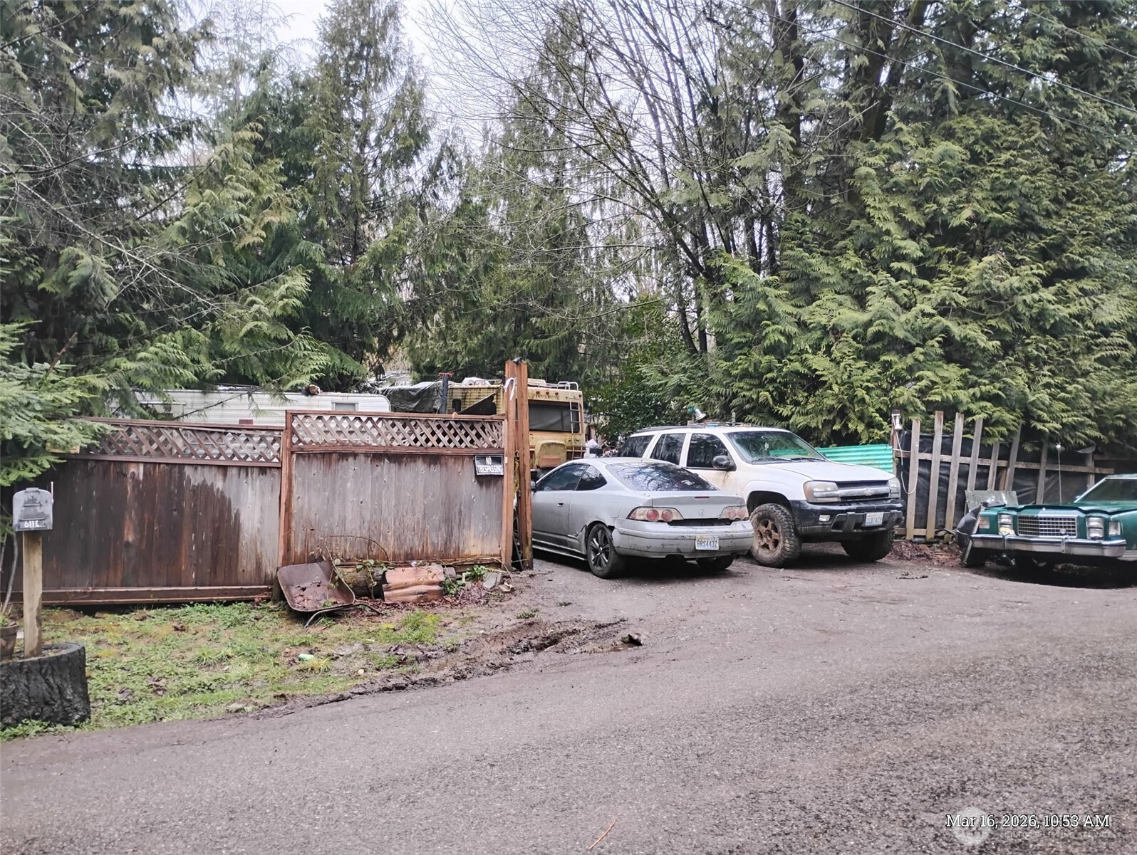 611 East Daniels Road Shelton, WA 98584 - Photo 8 of 11 a view of a car parked in front of a house